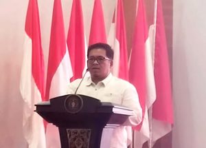 Kepala Dispora Kukar, Aji Ali Husni saat sambutan di acara pelantikan Bapopsi dan NPCI Kukar. (Foto: MF/Sinarkaltim.id)